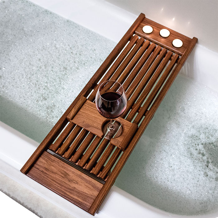 wooden tray on bathtub